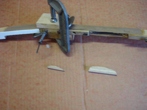 4 - wood shims glued and clamped between the veneer walls